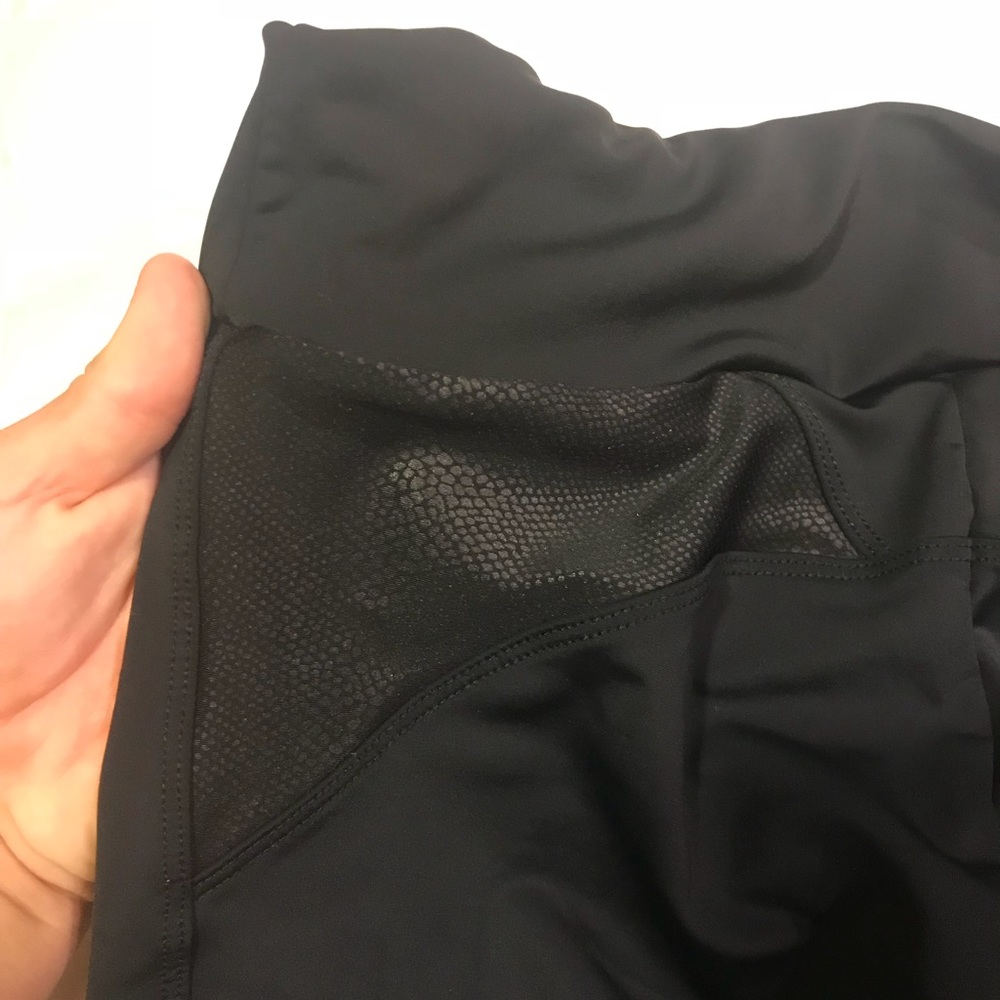 Black leggings w/ snakeskin print and mesh cutouts